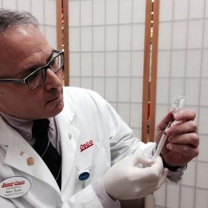 Jewel-Osco Registered Pharmacist Marc Rubin administering flu vaccines. // Photo Adela Crandell Durkee