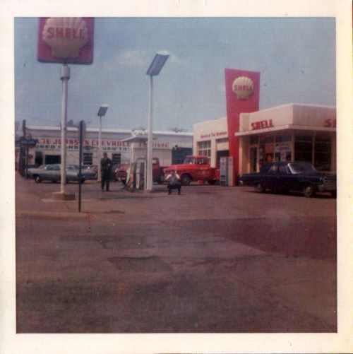 photo of the Doyle Shell Station with Johnson Chevrolet car  dealership in the background