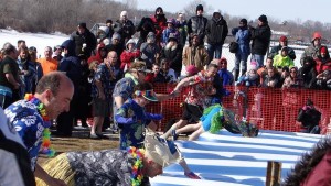 Dave McNichol, Ari Briskman, Thomas Kajohn, and Glenn Smith are among hundreds who participated in the Polar Plunge for the Special Olympics in Fox Lake on February 22. Photo -- Matt Smith