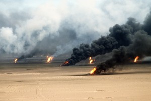 Oil well fires rage outside Kuwait City in the aftermath of Operation Desert Storm.  The wells were set on fire by Iraqi forces before they were ousted from the region by coalition force. Photo - Tech. Sgt. David McLeod 