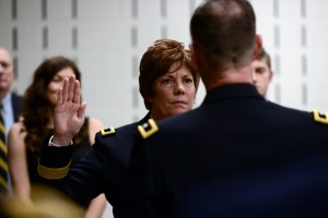 Maj. Gen. Daniel M. Krumrei, Illinois National Guard Adjutant General swears in newly promoted Brig. Gen. Alicia Tate-Nadeau on Saturday Mar. 7 at the Illinois Military Academy in Springfield. Photo by Spc. Jason Dorsey, Illinois National Guard Public Affairs