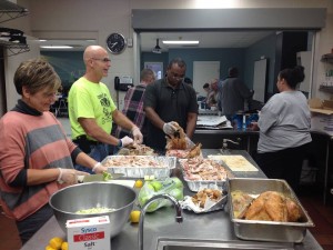 Preparing meals at the South Side Mission.