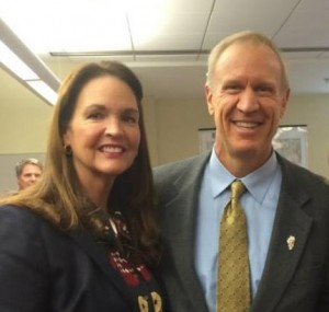 Gov. Bruce Rauner with county board member Michele Aavang.