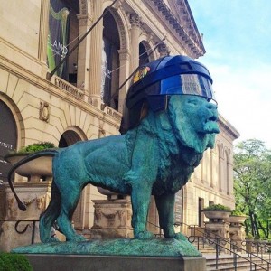 The Art Institute got into the celebration as it adorned the signature lions with hockey helmets. Photo by Sarah Surch Green