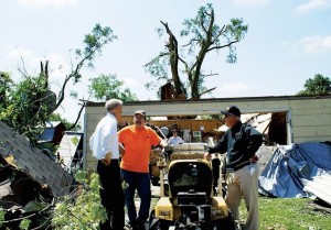 Gov. Bruce Rauner visits with residents of Delavan on July 17, the day after a tornado ripped through their community. (State of Illinois photo)