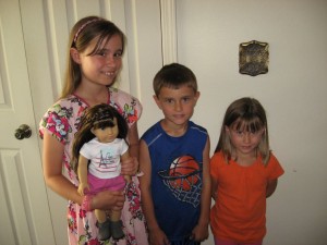 Metamora American Girl doll winner  Jillian Bober, 10,   brother Nolan and sister Gianna.