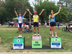 Jannette Rho stands on top of the podium as the winner of the Villa Park Grand Prix on Aug. 9. Women's cycling is a growing sport, according to Rho and other racers.