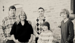 Doug, his wife Kathie and their three sons.