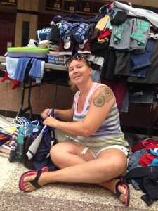 Bekki Utley (pictured) and her friend, Renee Wujek, average 30 to 40 hours a week picking up, sorting, washing, and distributing clothes, furniture, and supplies to those in need.  Photo by Adela Crandell Durkee