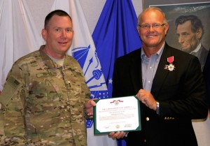 Maj. Gen. Richard J. Hayes Jr., the Adjutant General of the Illinois National Guard (left) poses with Col. (Ret) Michael Haerr after presenting Haerr with the Legion of Merit award during a ceremony at Camp Lincoln in Springfield, Illinois Aug. 25. Haerr of Eureka, retired in May after 33 years in the Illinois Army National Guard. The award cited Haerr's exceptionally meritorious service over the course of his career, which culminated as the Deputy Chief of Staff of Logistics. 