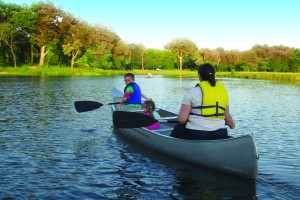Canoeists enjoy a nice fall day on the lake. (Photo courtesy of Forest Preserves of Cook County)