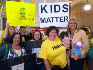 State Rep. Stephanie Kifowit meets with supporters of Early Intervention (EI) at the Capitol in Springfield today. Kifowit supported legislation Thursday to restore nearly $20 million in EI funding. (Photo courtesy State Rep. Kifowit Office)