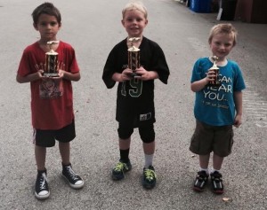 Cutline1: Winners in the Kiwanis Soapbox Derby lightweight winners were (left to right) Ari Vanmiddlesworth, second place, Grady Wesner, first place, and Aiden Elliott Kozk, third place. (Photo courtesy of Eureka Greater Area Kiwanis Club) 