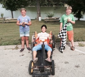 Winners in the Kiwanis Soapbox Derby heavyweight group were (left to right) Katie Duncan, second place, Joanna Moser, first place, and Ethan Currie, third place, Texas. (Photo courtesy of Eureka Greater Area Kiwanis Club)