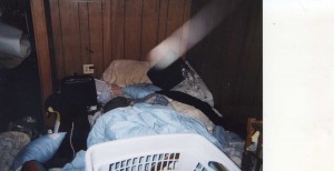 This photo, from a basement room in an Illinois home, shows a spirit in the form of a rod drawing energy from an electrical source. The bar of light also appears to have a circular orb nearby. Other corroborating evidence at the site indicated that paranormal activity had been taking place at the site. (Photo courtesy of McHenry County Paranormal Research Group)