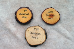 An annual tradition began in 1988, when Lee Baratta’s father, Tom, cut off the end of Lee and Laura’s Christmas tree, sanded, dated and shellacked it, giving it to them as a present to commemorate their new family’s first Christmas