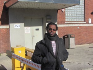 Kory Wright stands in front of an entrance to the Chicago Police Department's Homan Square facility. Wright, who has a clean record, said he was held at the facility for more than five hours of questioning on suspected heroin possession. That charge was later dismissed. Allegations have emerged that Chicago police use Homan Square to interrogate suspects and try to get them to become informants. (Photo by Kevin Beese/for Chronicle Media)