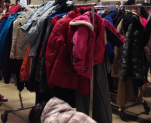 Racks of coats await the people from which to select. (Photo by Adela Crandell Durkee/for Chronicle Media)