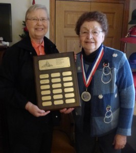 : Karen Fyke with the Woodford County Historical Society presented the annual James L. Fyke Memorial Service Award to Shirley Adams on Dec. 3.  (Photo provided by the Woodford County Historical Society) 