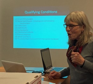 Christine Bernard, of Arlington Heights, describes the process to be certified by Illinois to use medical cannabis at the Sugar Beet Food Co-op in Oak Park Jan. 13.