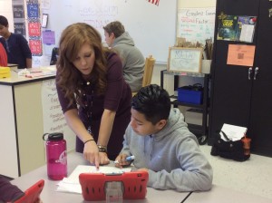 Barrington Middle School 7th Grade math teacher Meagan Stass helps students in her classroom. (Photo Courtesy of Meagan Stass)