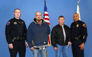 Bloomington Police Officer Scott Sikora, Christopher Robles, James Trammell and Police Chief Brendan Heffner. Trammel and Robles were honored for assisting the police in a recent arrest. (Photo courtesy Bloomington Police Department)