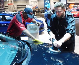 Crews keep Chicago Auto Show vehicles clean and shiny with frequent attention.
