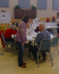 New Executive Director Sandra Pastore talks with one of the visitors to the Oswego Senior Center  at the Old Traughber School at Franklin and Washington streets. (Chronicle Photo by Erika Wurst) 