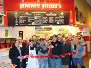 Jimmy John’s Manager Donny Cox and franchise owners Chad Roepenack and Justin Clark were joined by Dennis Short, Andy Sparks, and Teresa Mack. Back row (l-r): Harry Wilmert, Dennis Barron, Brent Oest, Paul Scherer, and the Rev. Jim McClarey.