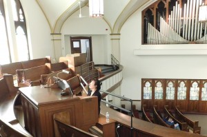 Grand music — Jea Yi performs on Mendelssohn Hall's grand pipe organ on a recent Friday. She'll be back for another free recital at noon on Friday, Feb. 26.  Performances are scheduled on the last Friday of each month. (Chronicle photo).
