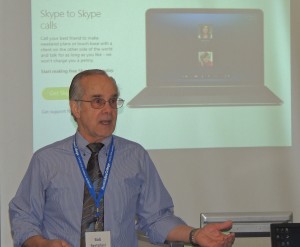 Bertolasi explains how to download Skype. (Photo by Lynne Connor/for Chronicle Media)