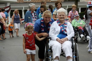 The Fourth of July intergenerational parade around the campus was one of the favorite activities of Sarah Kurth’s family when her two daughters attended Shepherd’s Flock. (Photo courtesy of Sheperd’s Flock)