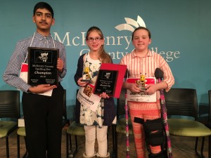 Ved Patel (from left) was the winner of this year’s McHenry County Spelling Bee, while Serena Huberty was second runner-up and Jillian Popovich was first runner-up. (Photo by Adela Crandell Durkee/for Chronicle Media)