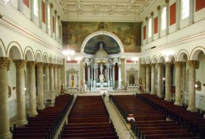 The interior of St. Adalbert’s Romanesque Revival church, 1650 W. 17th St., is a well-preserved gem with ornate stained glass windows, marble statues and an impressive — if only partially working — 1914 W.W. Kimball pipe organ. (Photo by Jack McCarthy / Chronicle Media)
