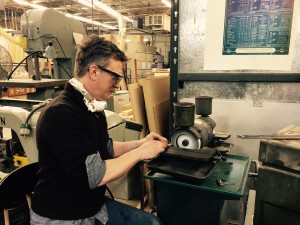 Jason Shanfield mills a new router bit at Pumping Station One Hacker Space. (Photo by Jean Lotus/Chronicle Media)
