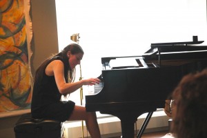Pianist Natasha Stojanovska performs at a “salon” concert for members of the Chicago Musicians Club of Women.