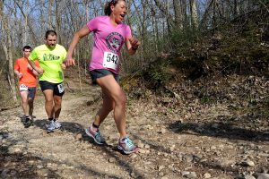 Runners Karissa Pecci (542), Mark Pecci (544) and Mike Eads (551) traverse a curvvy and rocky uphill during the Saw Wee Kee Spring Trail Challenge at Saw Wee Kee Park in Oswego on Saturday, April 16, 2016. Photo by Steven Buyansky