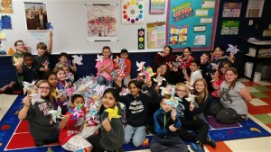 Students at Lakewood Elementary School in Oswego recently participated in the Pinwheels for Peace project raising $3,300 for charity. (Photo courtesy of Oswego Community School District 308)