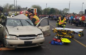 Oswego High School recently conducted an “Operation Prom” crash site scenario to demonstrate to students the immediate effects of drinking and driving.  The event took place in the parking lot at OHS. To view the video, go the District 308 Facebook page. (Photo courtesy School District 308) 