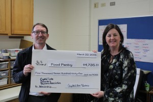 Bernotas teacher and CLETA co-president Jean Bowman presented a check on March 22 in the amount of $4,735 to Bill Eich, president of the Crystal Lake Food Pantry, on behalf of the Crystal Lake Elementary Teachers Association.