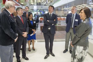 Italian Prime Minister Matteo Renzi (center) tours the Remote Operations Center West at Fermilab and learns about neutrinos. (Photo courtesy of Fermilab) 