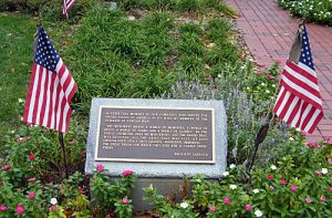 A plaque at the Elmhurst Veterans Memorial pays tribute to those who died serving the United States.