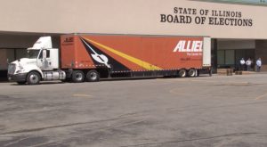 A semi-truck containing a most 600,000 citizen signatures is parked in front of the Illinois State Board of Elections in Springfield Friday.