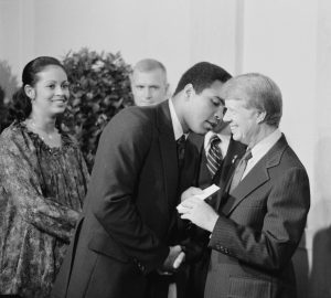 President Jimmy Carter greets Mohammed Ali at a White House dinner celebrating the signing of the Panama Canal Treaty, Washington, D.C. (Photo by Marion S. Trikosko. From the U.S. News & World Report collection at the Library of Congress.)