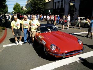 Dave Hauman and Craig Colledge of Bloomington, and David Fitch of Normal are traveling cross country in Hauman's red vintage 1970 Jaguar XKE as part of the 2,200 mile Great Race. (Photo courtesy Kool Cats Krewe Facebook page)