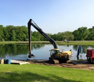 An eight-and-a-half acre lake at the Timberlake Club on Farmington Road is open for swimming to club members and guests after a recent dredging project removed eight loads of “muck” from the bottom. Club manager Kim Slover calls the club the “best-kept secret in Peoria.” (Photo courtesy Timberlake Club)