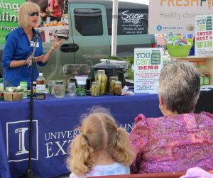University of Illinois Extension Educator Laura Barr gives weekly canning demonstrations at the Aurora Farmers Market. (Photo courtesy University of Illinois Extension)