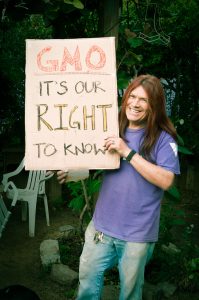A protester advocates for the labeling of GMO constituents in foodstuffs. (Photo by Daniel Goehring