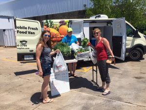 The Gifts in the Moment Foundation’s Mobile Fresh Food Van stops Tuesday through Friday at nine locations, such as public housing, community centers and more, in Peoria, East Peoria and Eureka. (Photo courtesy of The Gifts in the Moment Foundation)