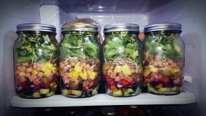 Any canning jar with a lid can be used to pack a healthy, portable lunch such as a mixed green salad. (Photo courtesy University of Illinois Extension)